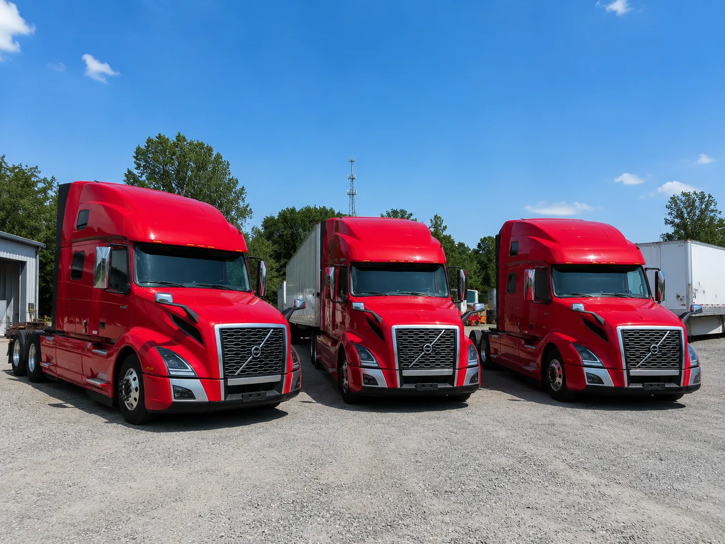 KDA Logistic fleet of red semi trucks at the yard